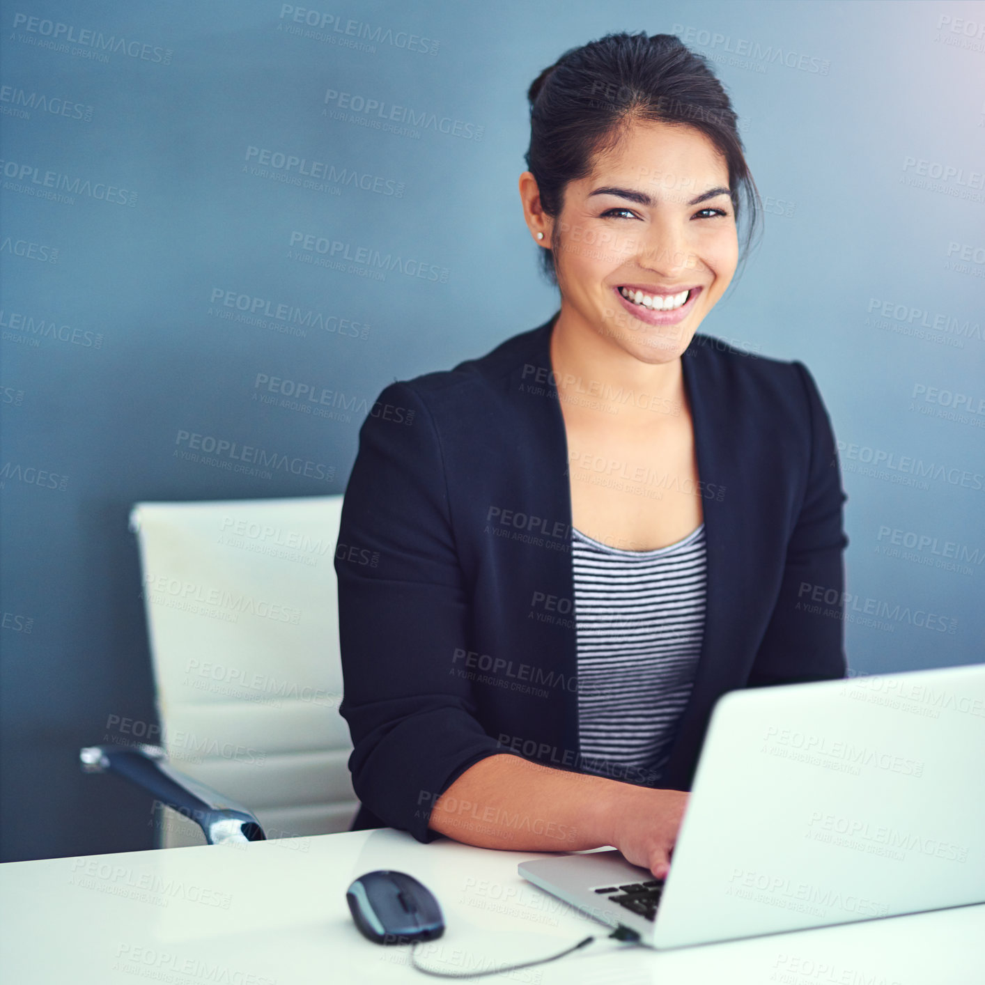 Buy stock photo Business woman, portrait and planning on computer with research or typing by wall background. Professional worker in human resources smile for software on laptop with career or project at office desk