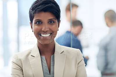 Buy stock photo Cropped portrait of a businesswoman standing in the office