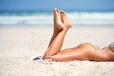 Buy stock photo Woman, feet and bikini on beach sand for holiday vacation, resort relax for paradise travel. Female person, legs and swimsuit for outdoor costal trip for summer journey or tanning, sunlight at ocean