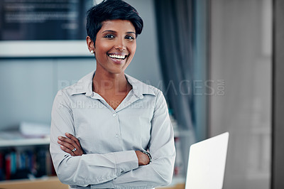 Buy stock photo Portrait of a young businesswoman standing in her office