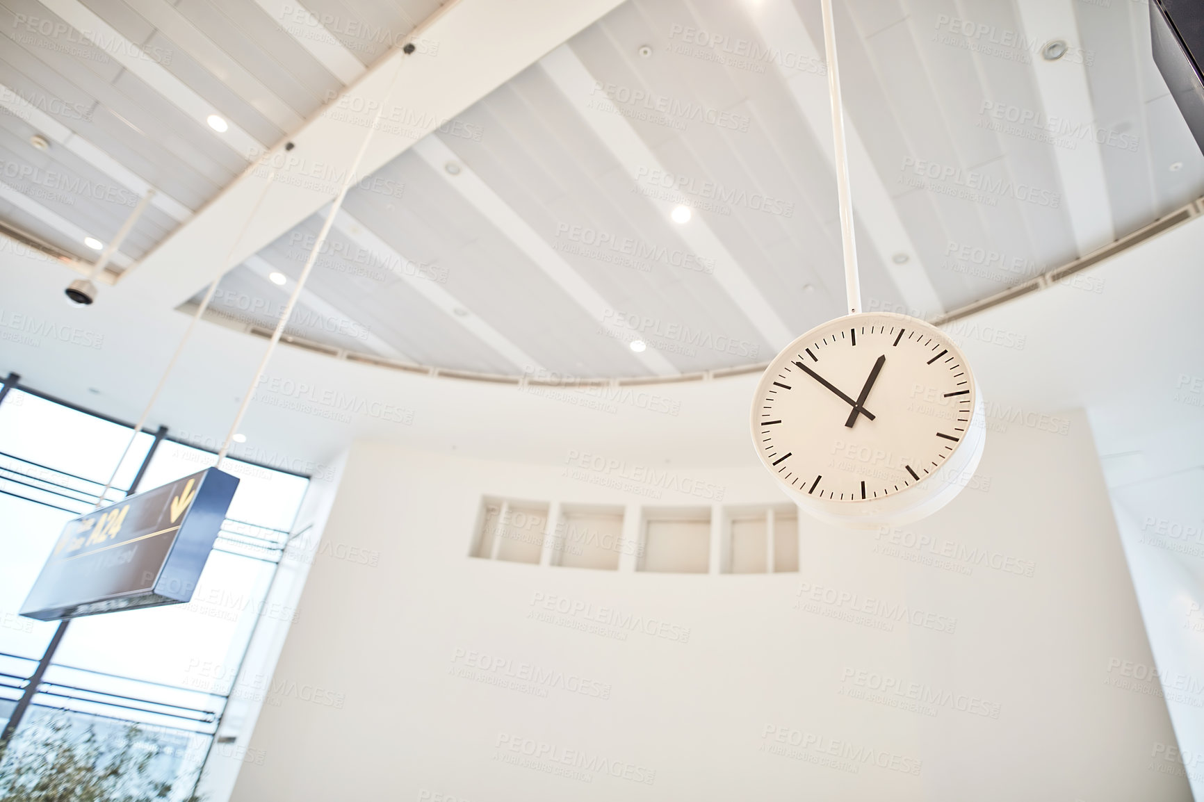 Buy stock photo Airport, empty and waiting room with clock, ceiling and roof of terminal, lobby and architecture with detail. Board, interior and design of building, abstract and space in business and corridor