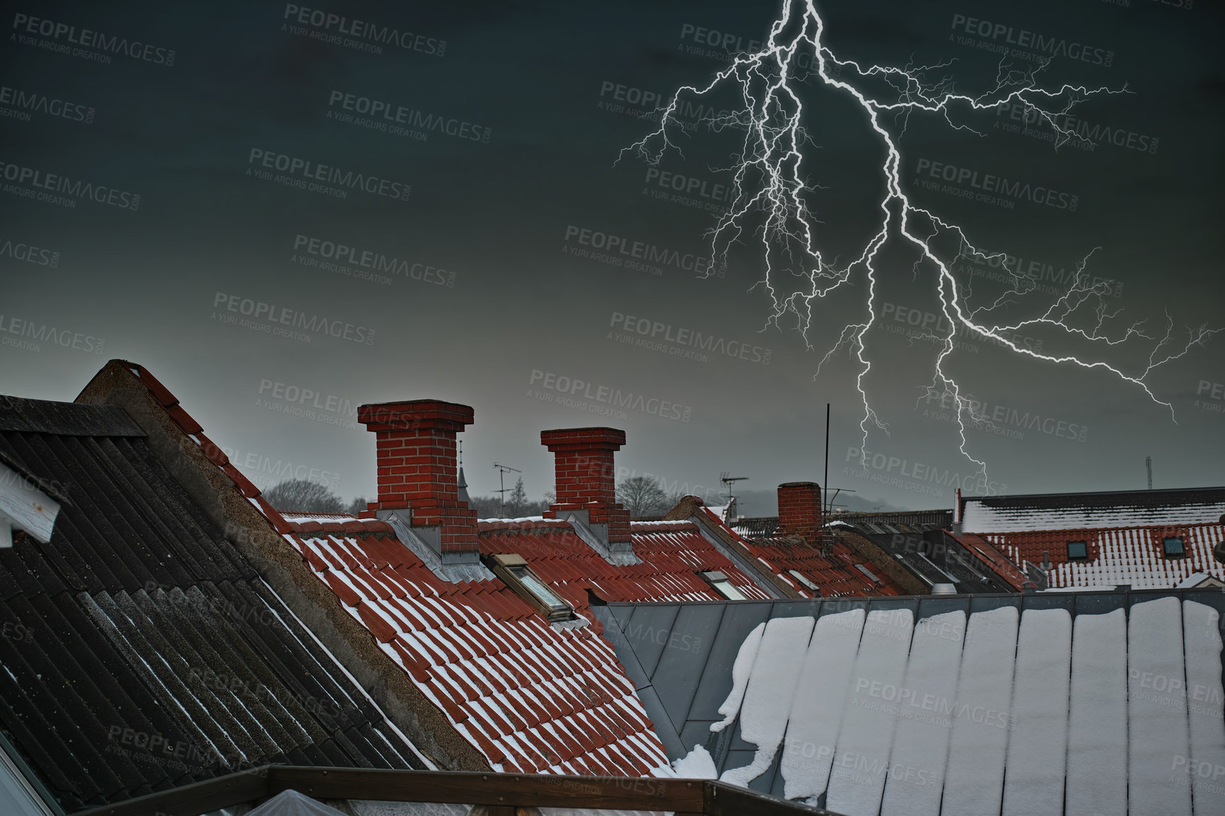 Buy stock photo Thunder striking above chimney on red tiled roof. A dramatic lighting bolt in dark grey sky over a residential town with traditional slate roofing. Thunderstorm during a gloomy scary dark winter night