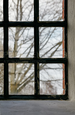 Buy stock photo Closeup of an old window. Feeling trapped, scared, depressed and lonely during lockdown. Hiding inside at home, suffering from social anxiety, longing and looking to escape house for change and hope