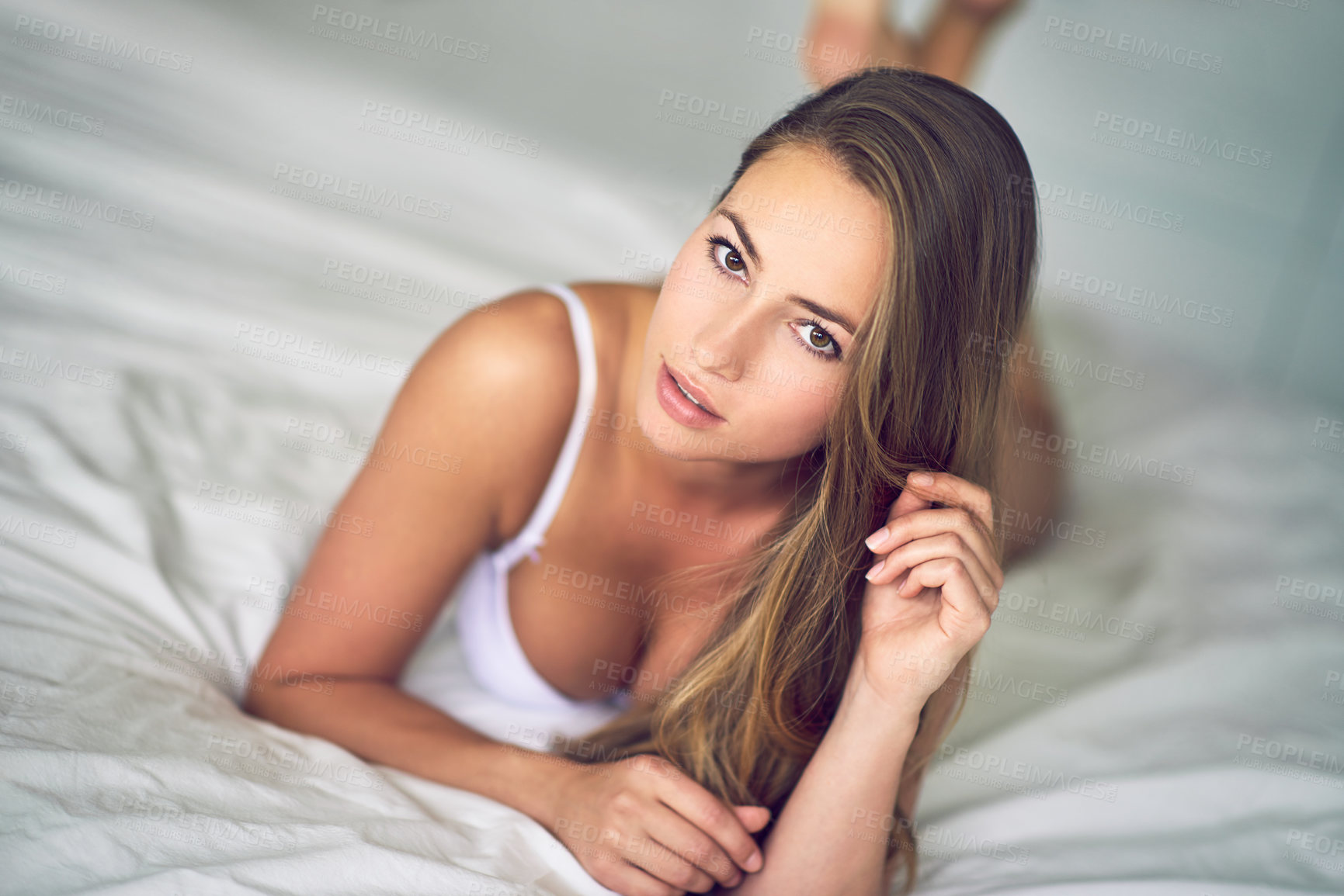 Buy stock photo Cropped portrait of a young woman posing in her underwear