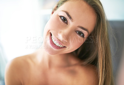 Buy stock photo Cropped portrait of a beautiful young woman at home