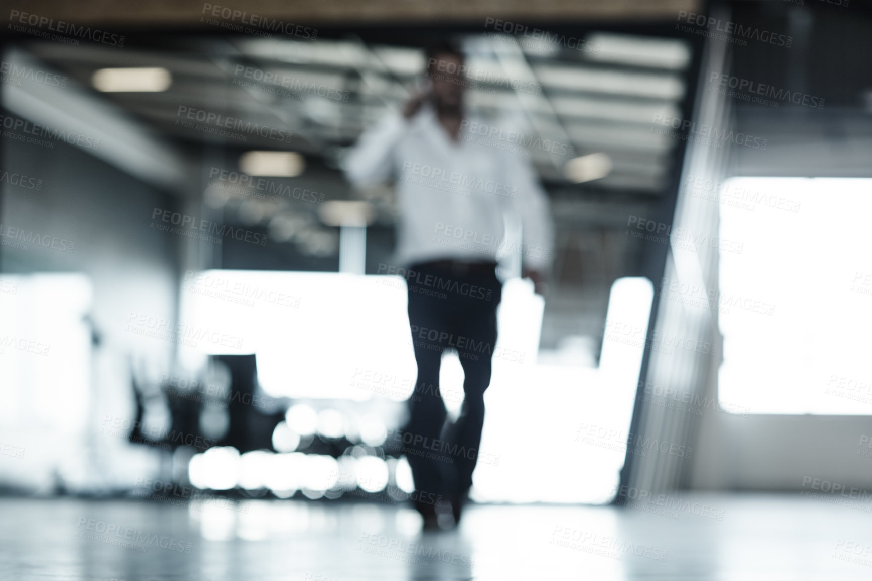 Buy stock photo Phone call, walking and man in blurred office with mobile networking, communication and connection. Smartphone, talking and businessman in conference room planning schedule, agenda or conversation