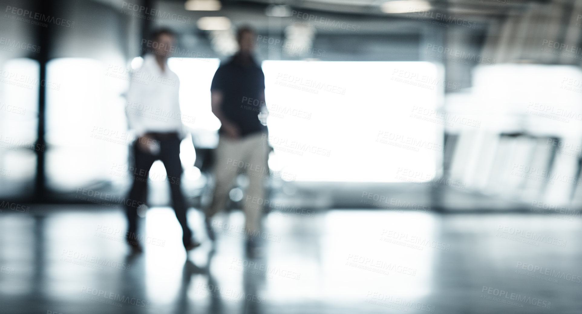 Buy stock photo Full length shot of two businessmen walking through an office