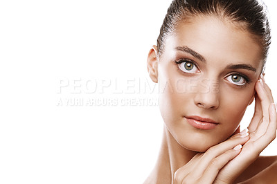 Buy stock photo Studio portrait of a beautiful young woman touching her face isolated on white