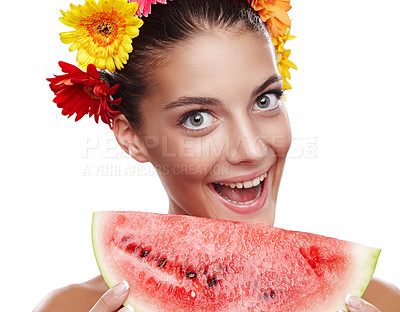 Buy stock photo Cropped portrait of a beautiful young woman wearing a crown of flowers and eating a watermelon