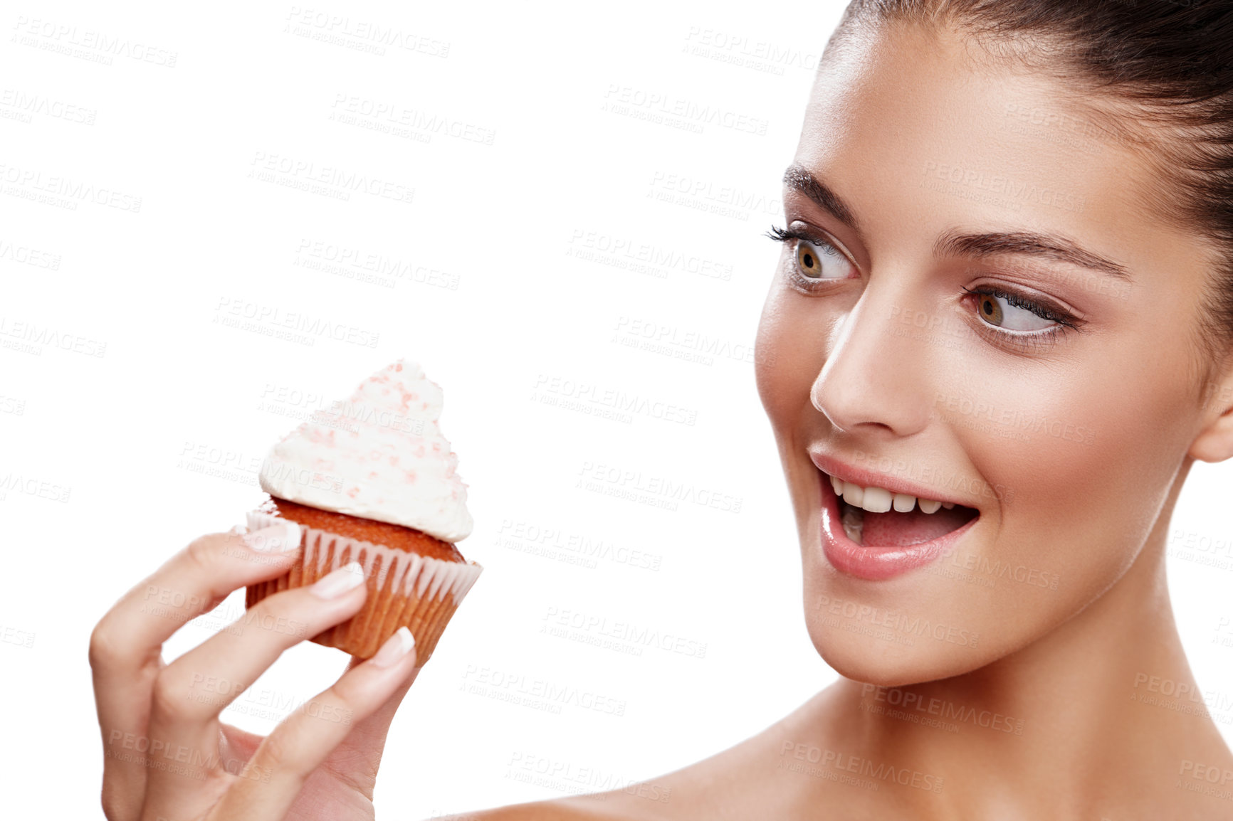 Buy stock photo Studio shot of a beautiful woman holding up a cupcake