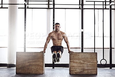 Buy stock photo Man, portrait and cross fit with push ups in gym for muscle strength, strong shoulders and balance skill. Athlete, person and training session in sports center for endurance, healthy body or wellness