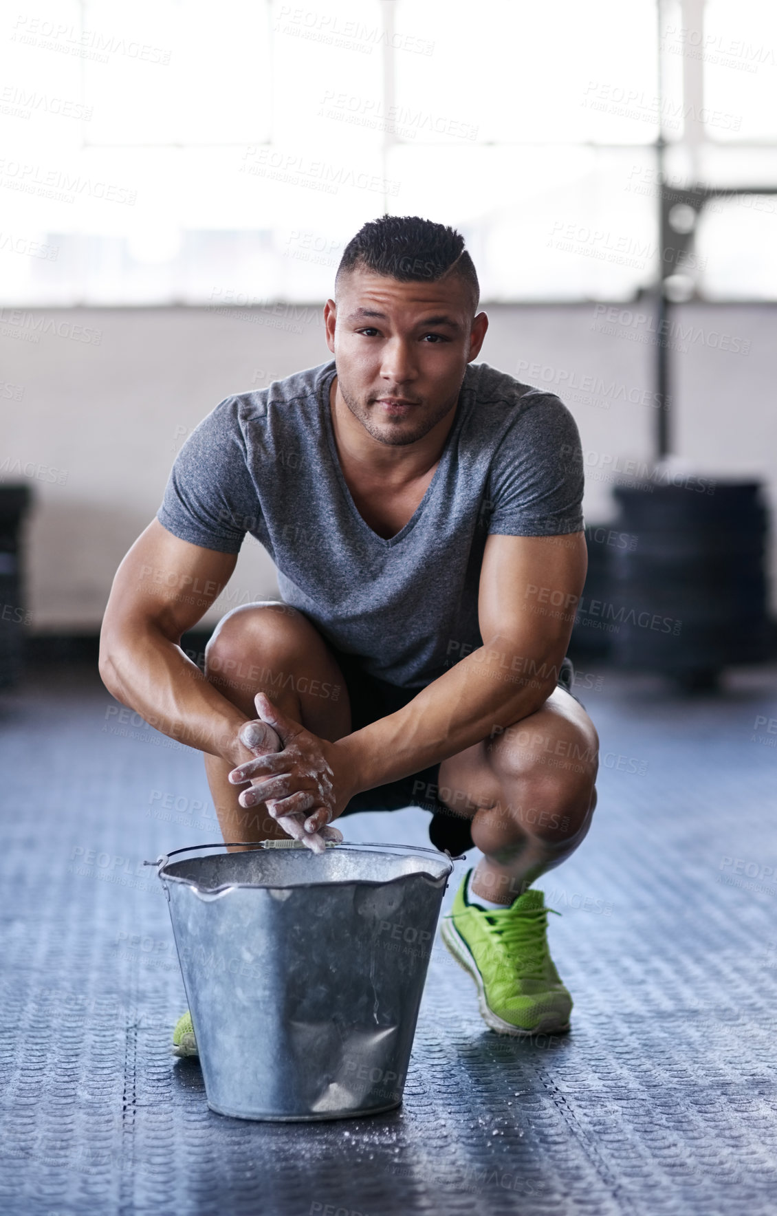 Buy stock photo Man, portrait and gym with powder or ready for exercise, preparing hands for training or bodybuilding. Male person, healthy and sport in club for wellness or fitness, start with routine for workout