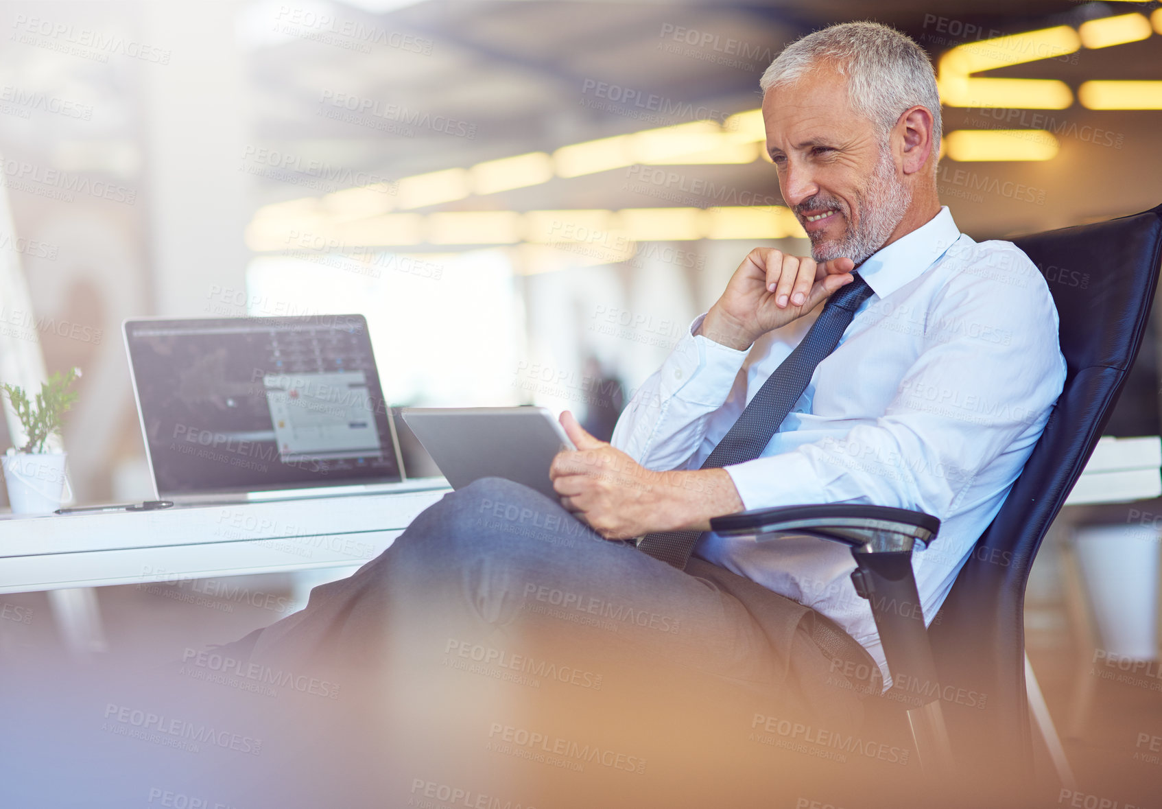 Buy stock photo Mature man, business and thinking with tablet at office for good news and email notification as project manager. Corporate, male person and smile or happy with online research, idea and communication