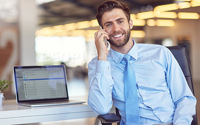 Buy stock photo Portrait of a young businessman using his phone in the office