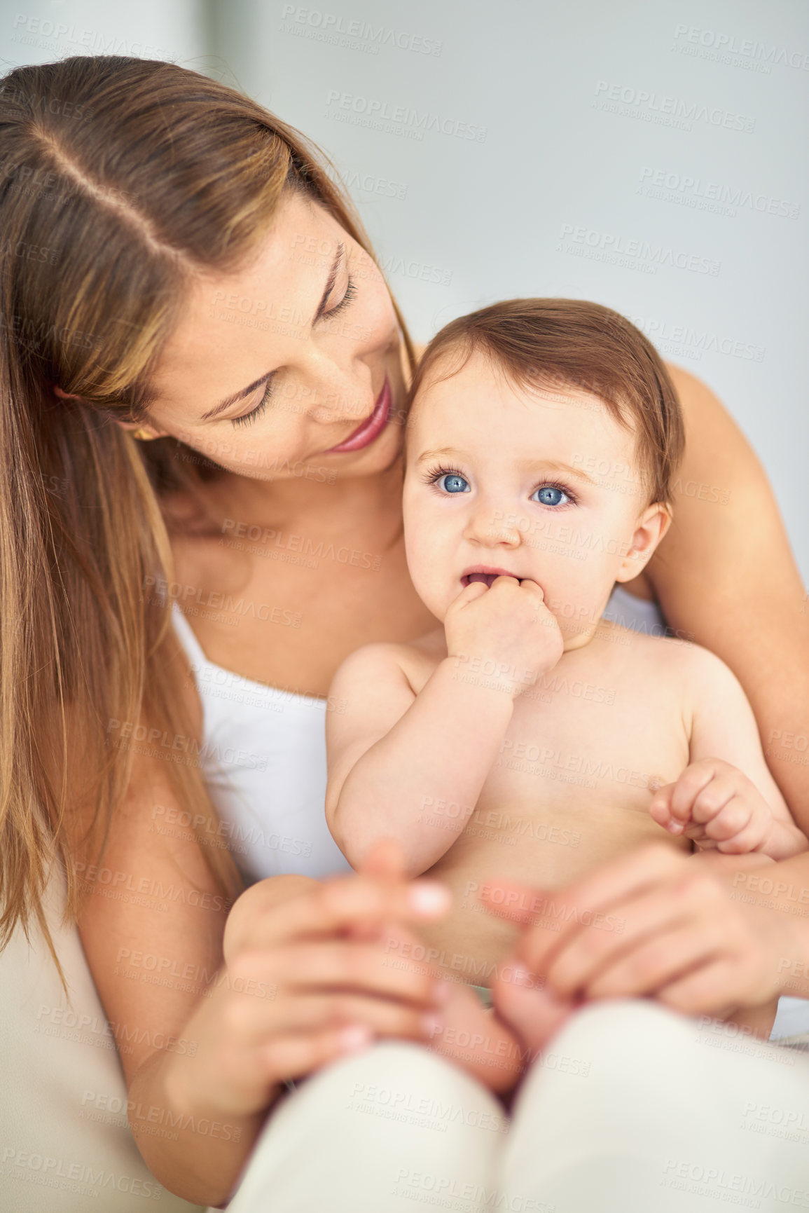 Buy stock photo Mother, baby and playing in home for wellness, care and support for growth and relax or kid. Development, hands and family in house or lounge for love, child and bonding together for trust in morning