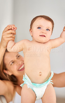 Buy stock photo Shot of a mother playing with her adorable baby girl