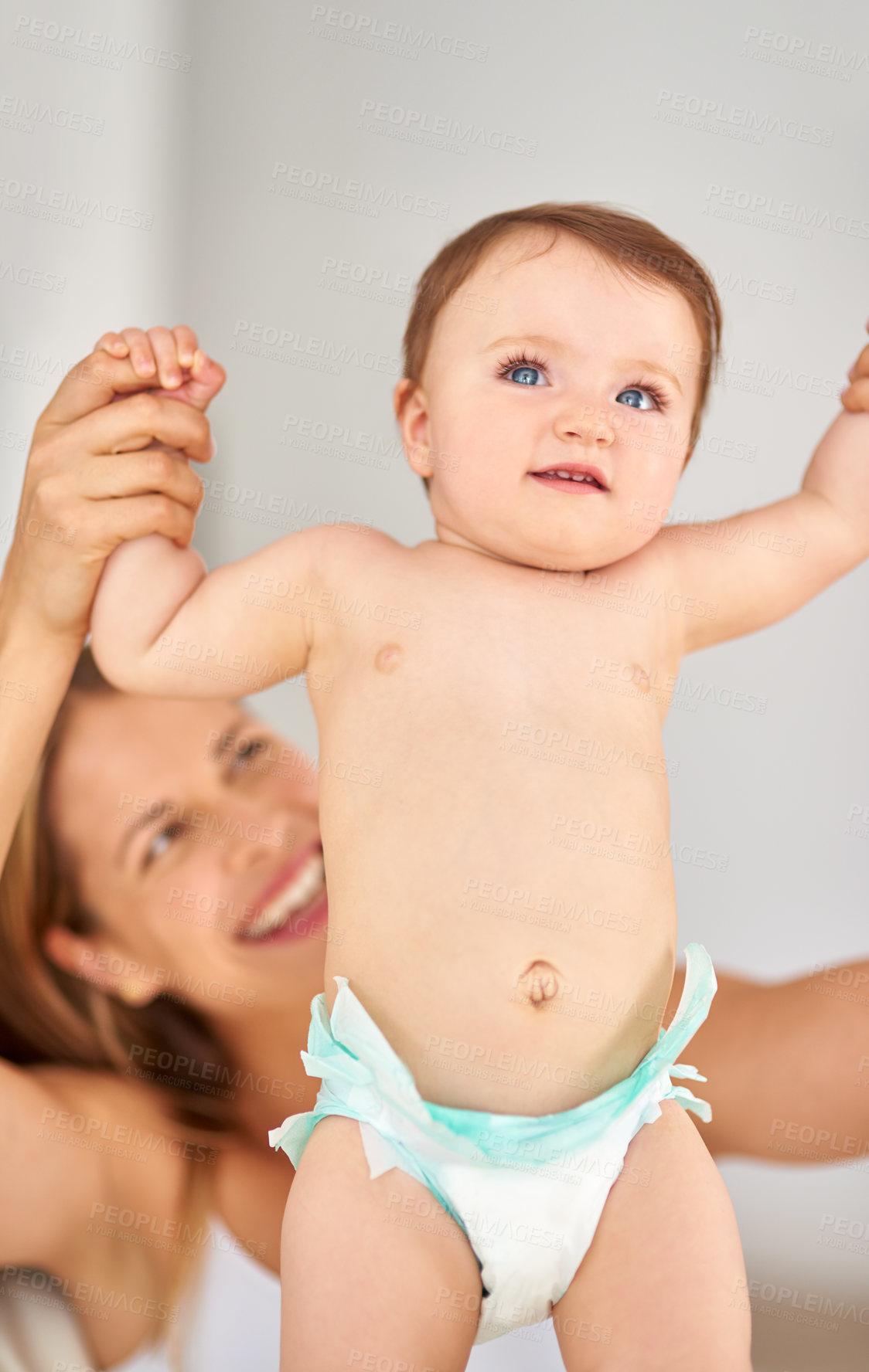 Buy stock photo Shot of a mother playing with her adorable baby girl
