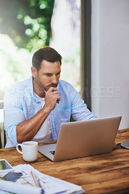 Buy stock photo Cropped shot of a businessman working at home
