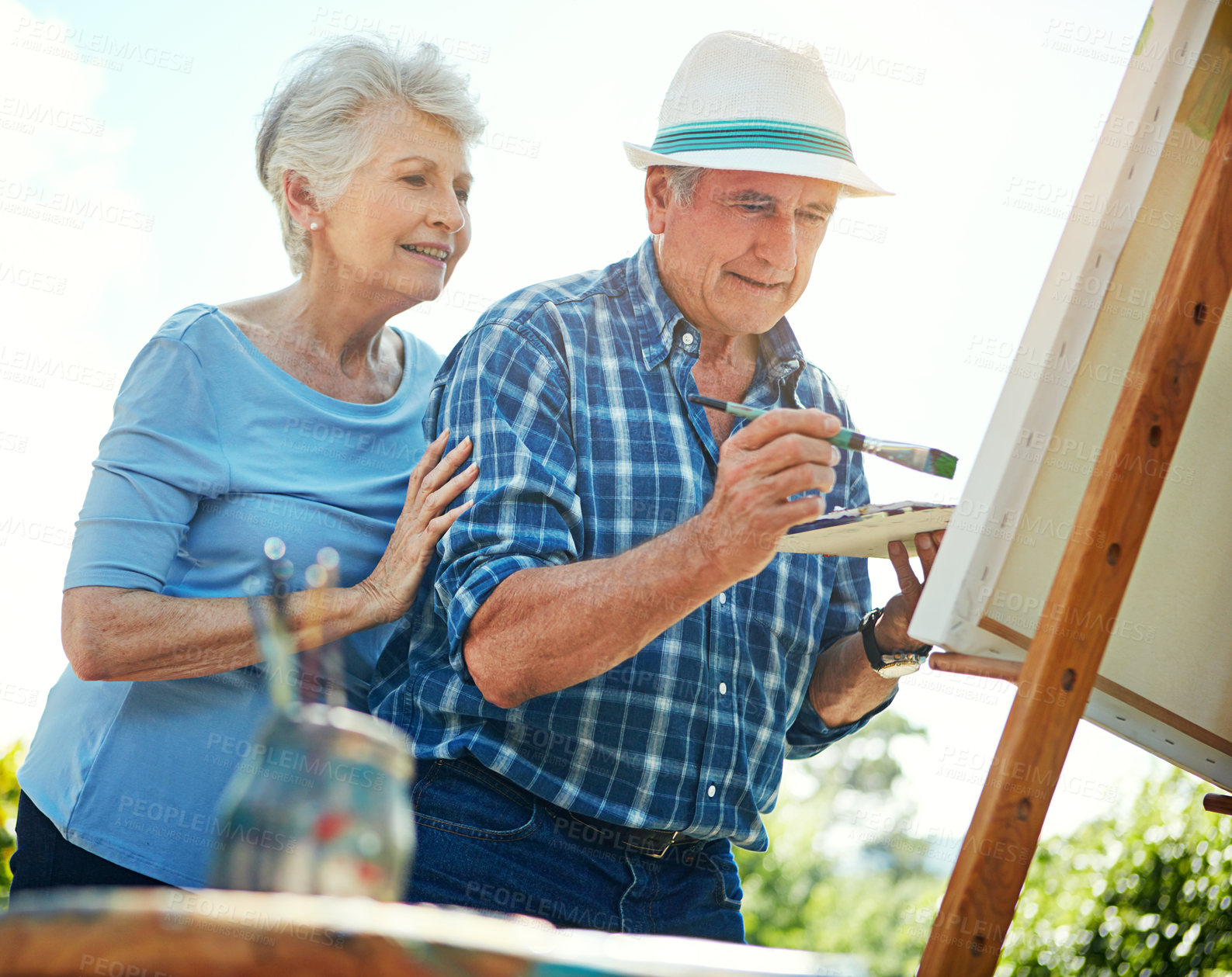 Buy stock photo Garden, painting and senior couple with canvas for picture creation, care or support hobby for connection. Outdoor, bonding and old people with brush for retirement interest, creativity and low angle