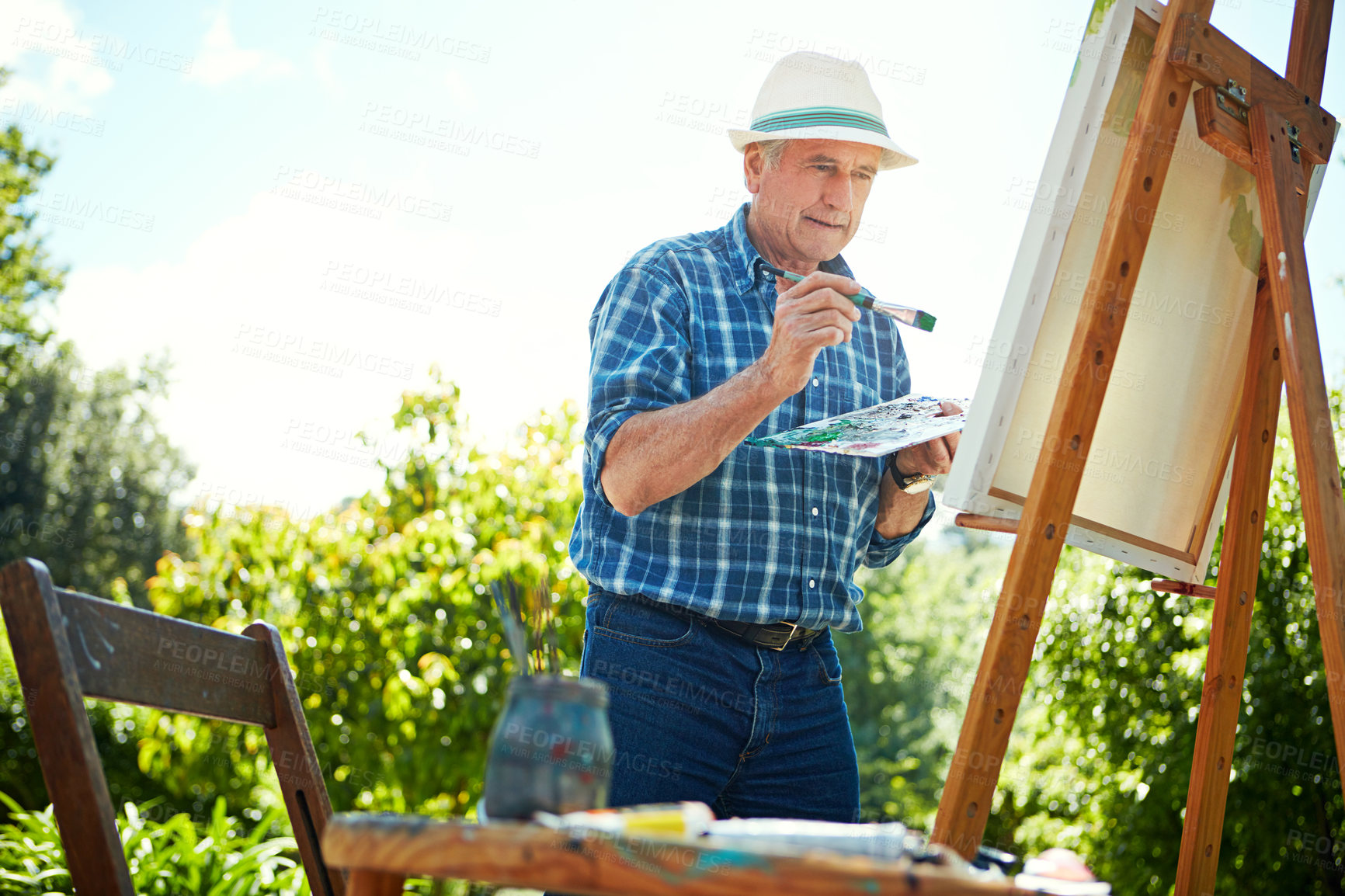 Buy stock photo Painting, canvas and brush with old man in nature for creative project, inspiration and garden drawing. Retirement, artist and easel with senior person outdoor for botanical artwork and painter