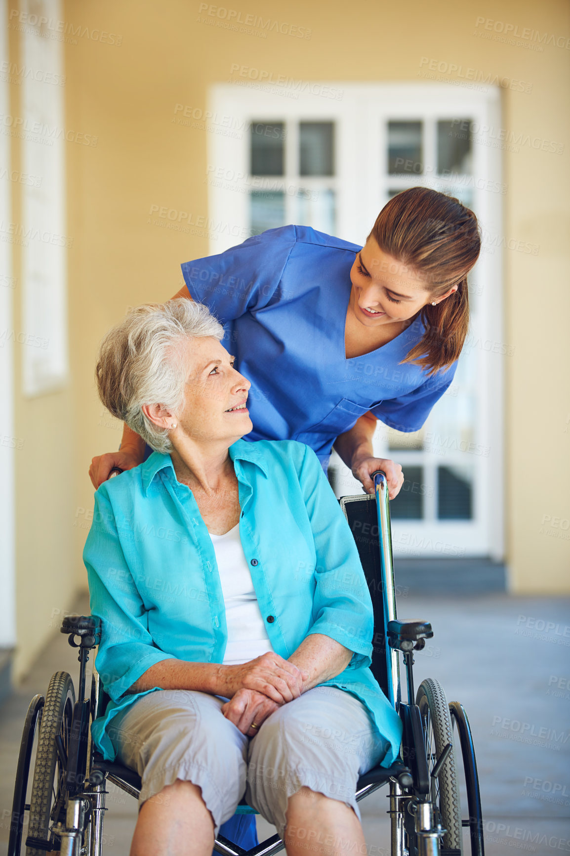 Buy stock photo Talking, nurse or happy old woman in wheelchair in hospital clinic helping an elderly patient for support. Trust, smile or healthcare medical caregiver speaking to a senior person with a disability