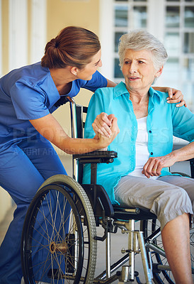 Buy stock photo Communication, caregiver or old woman in a wheelchair in hospital helping an elderly patient for support. Speaking, disabled or healthcare social worker talking to a senior person with a disability