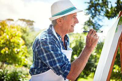 Buy stock photo Cropped shot of a senior man painting in the park