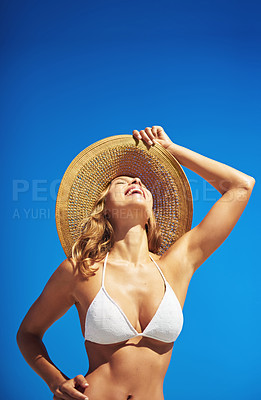 Buy stock photo Shot of a gorgeous young woman in a bikini at the beach