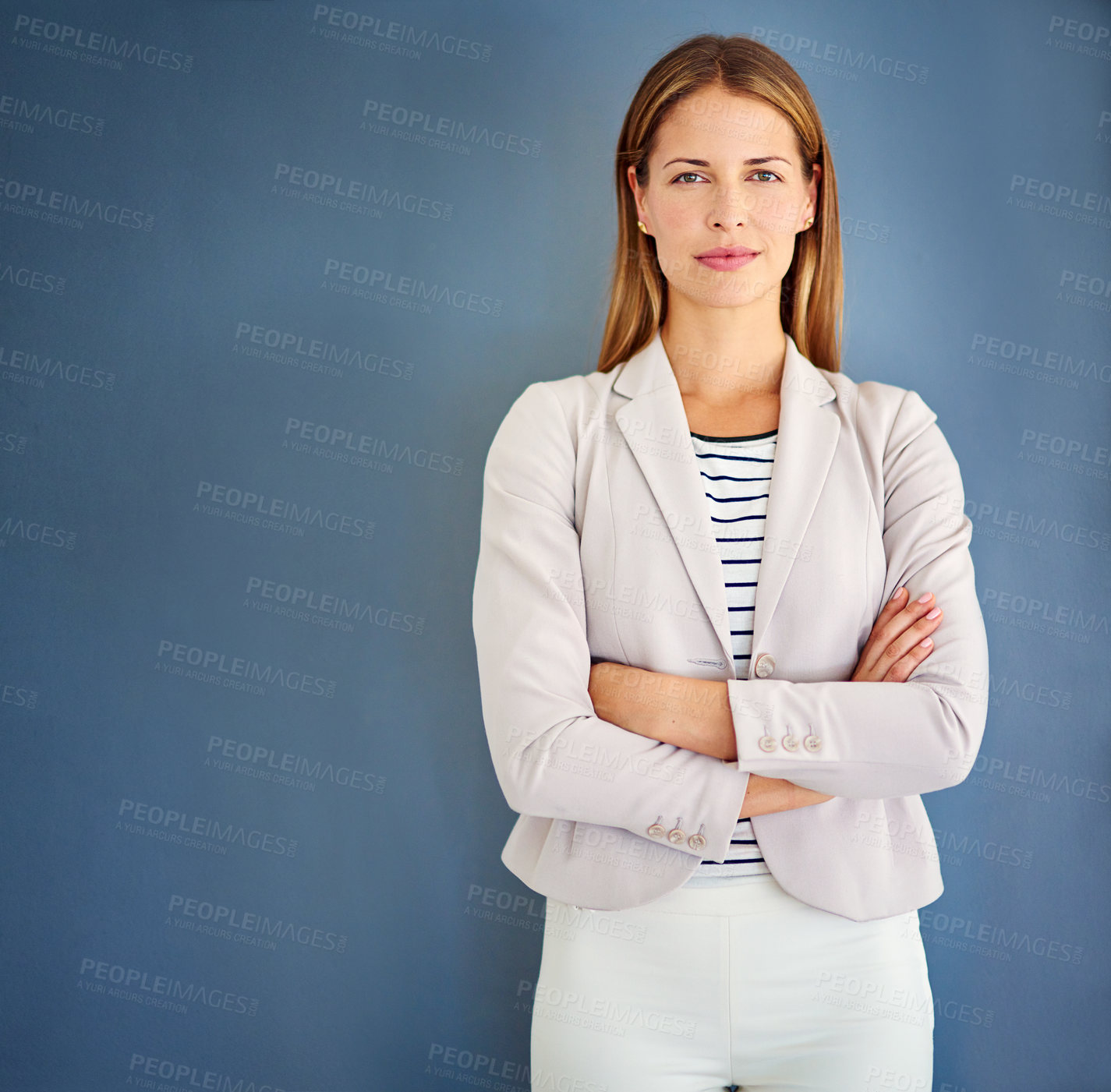 Buy stock photo Portrait, consultant and woman with arms crossed, fashion and designer on blue studio background. Face, trend expert or journalist for style magazine, editor and career ambition with professional