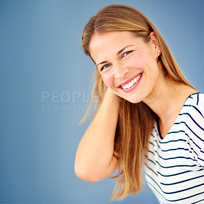 Buy stock photo Portrait, beauty and woman with fashion, happiness and confidence on blue studio background. Face, person and model with stylish clothes, casual outfit and trendy with mockup space, joyful and smile