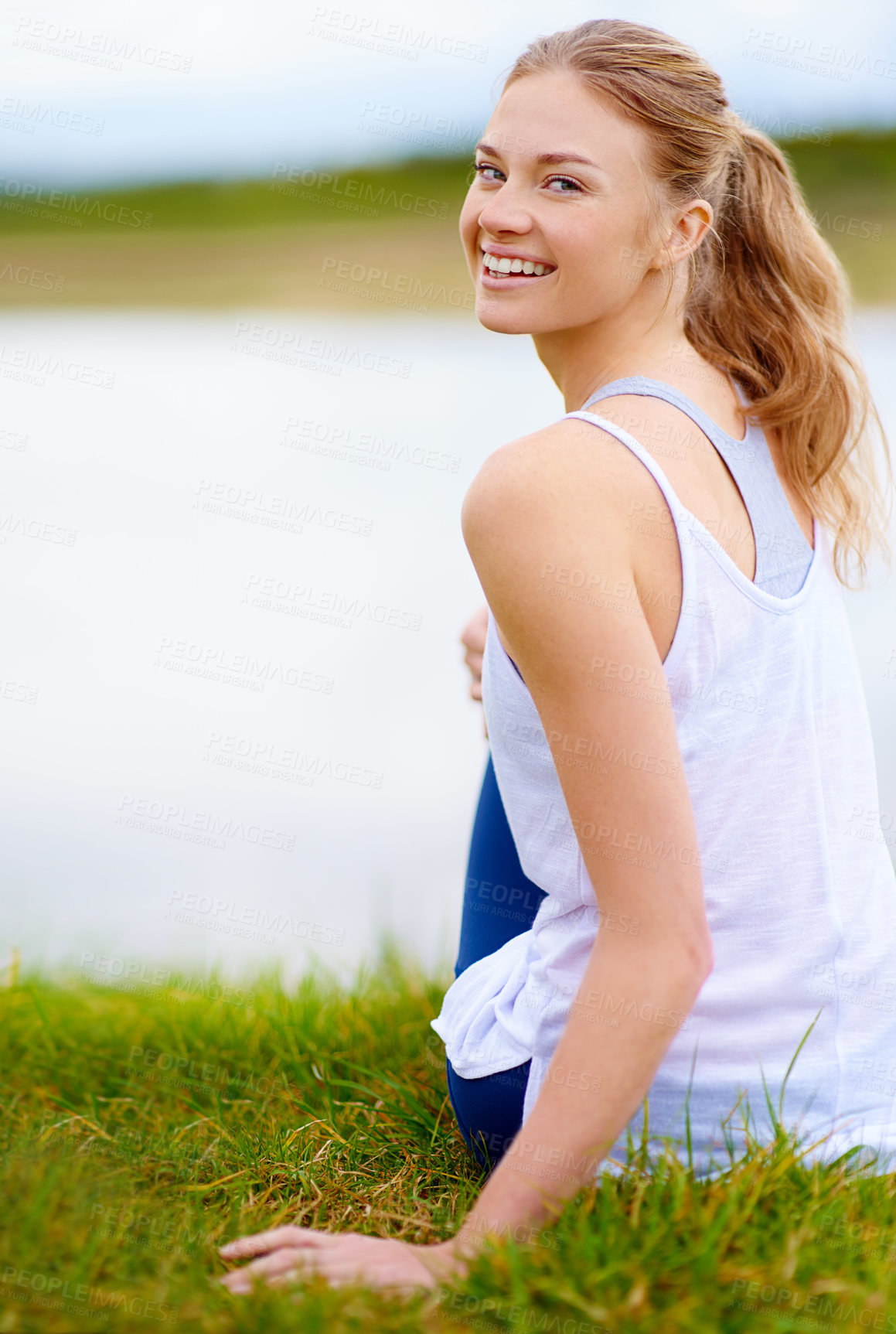 Buy stock photo Girl, smile and portrait in nature,  outdoor and relax in park for peace on grass, calm and happy. Break, student and person in weekend, rest and carefree for fresh air in woods with lake or holiday