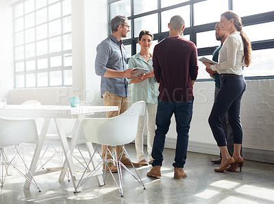 Buy stock photo Full length shot of a group of coworkers standing in the boardroom