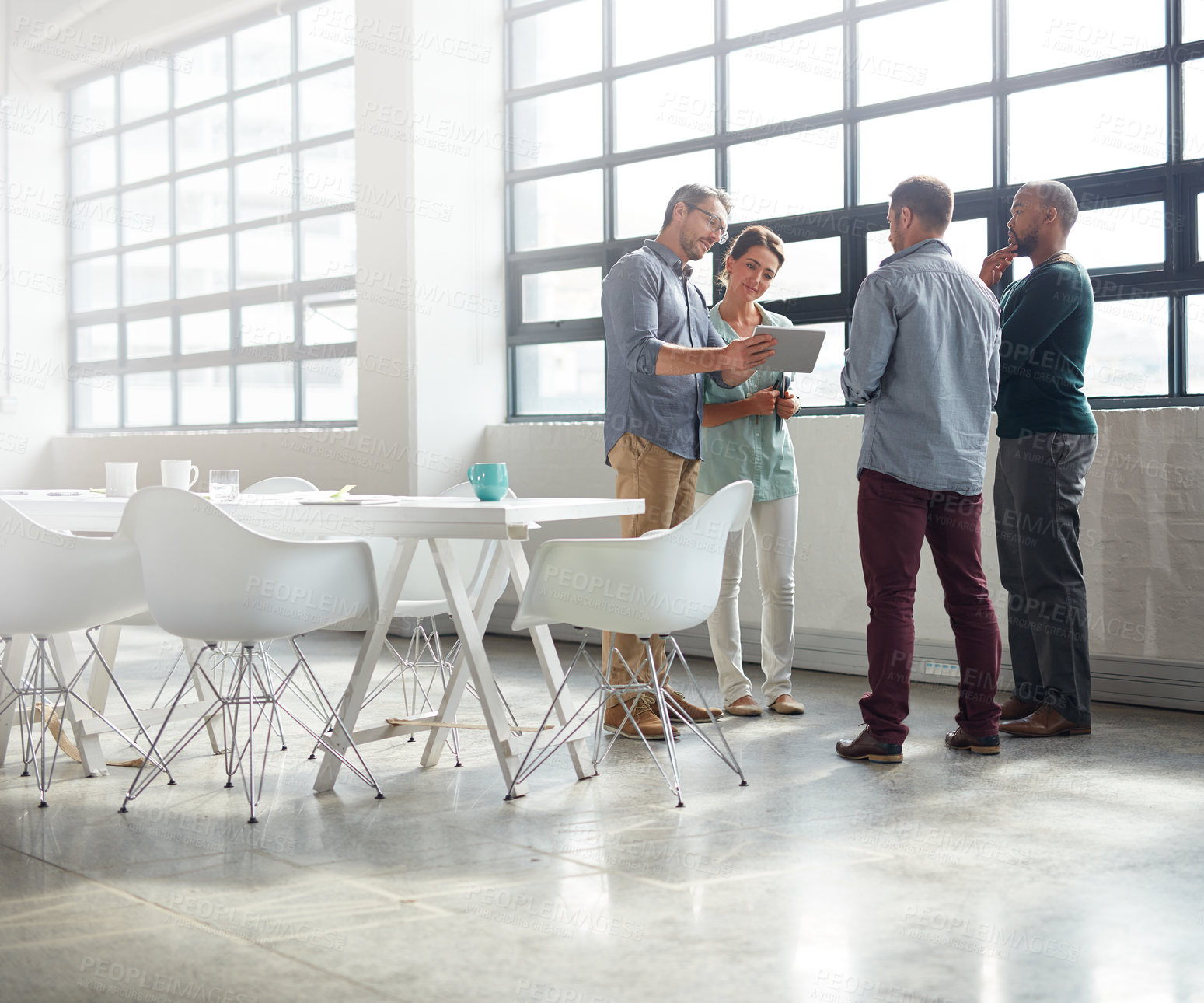 Buy stock photo Full length shot of a group of coworkers standing in the boardroom