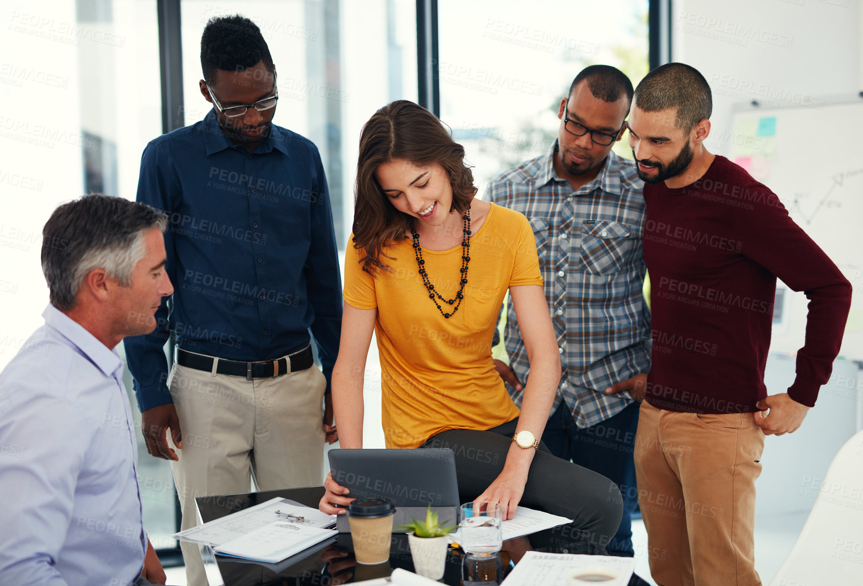 Buy stock photo Cropped shot of a group of businesspeople in a meeting