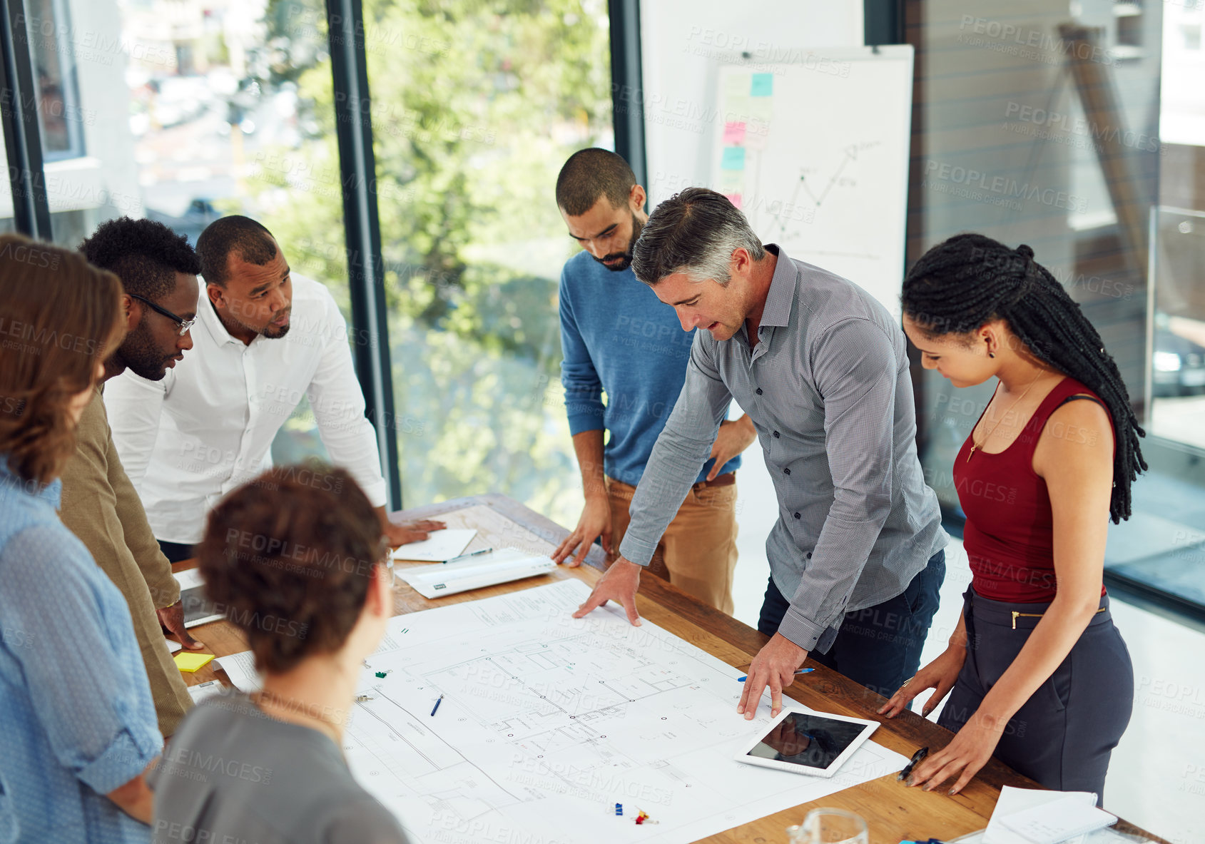 Buy stock photo Cropped shot of a group of architects in the boardroom