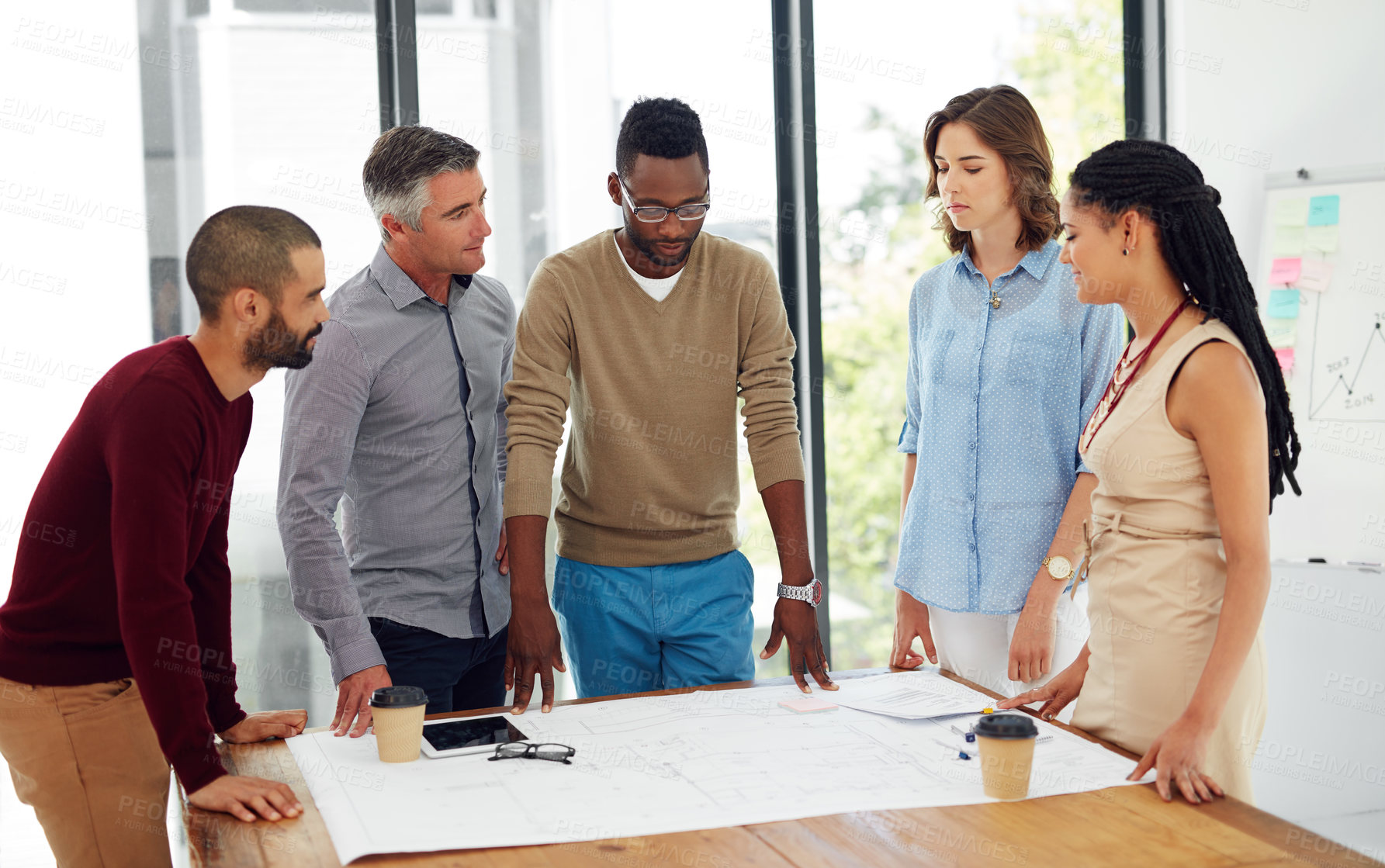 Buy stock photo Cropped shot of a group of architects in the boardroom