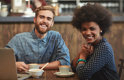 Buy stock photo Portrait of a young couple using a laptop together on a coffee date
