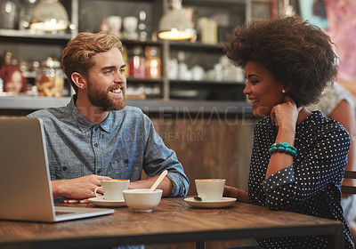Buy stock photo Shot of a young couple enjoying a coffee date