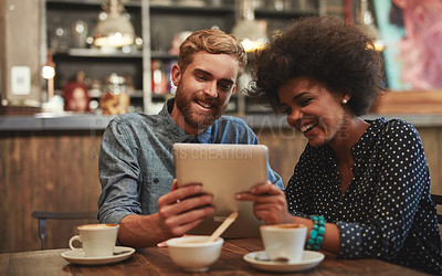 Buy stock photo Couple, tablet and laughing or happy in coffee shop with social media meme, bonding and funny online information. Interracial, people and smile in cafe with tech app for comic post update and relax