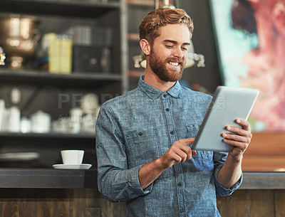 Buy stock photo Man, tablet and business owner with typing in coffee shop for planning, reading and contact for deal on stock. Person, entrepreneur and touchscreen with research for organic supplier on web in cafe