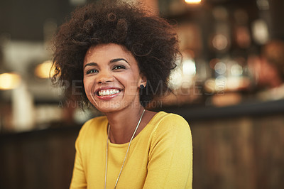 Buy stock photo Shot of a happy young woman in a cafe
