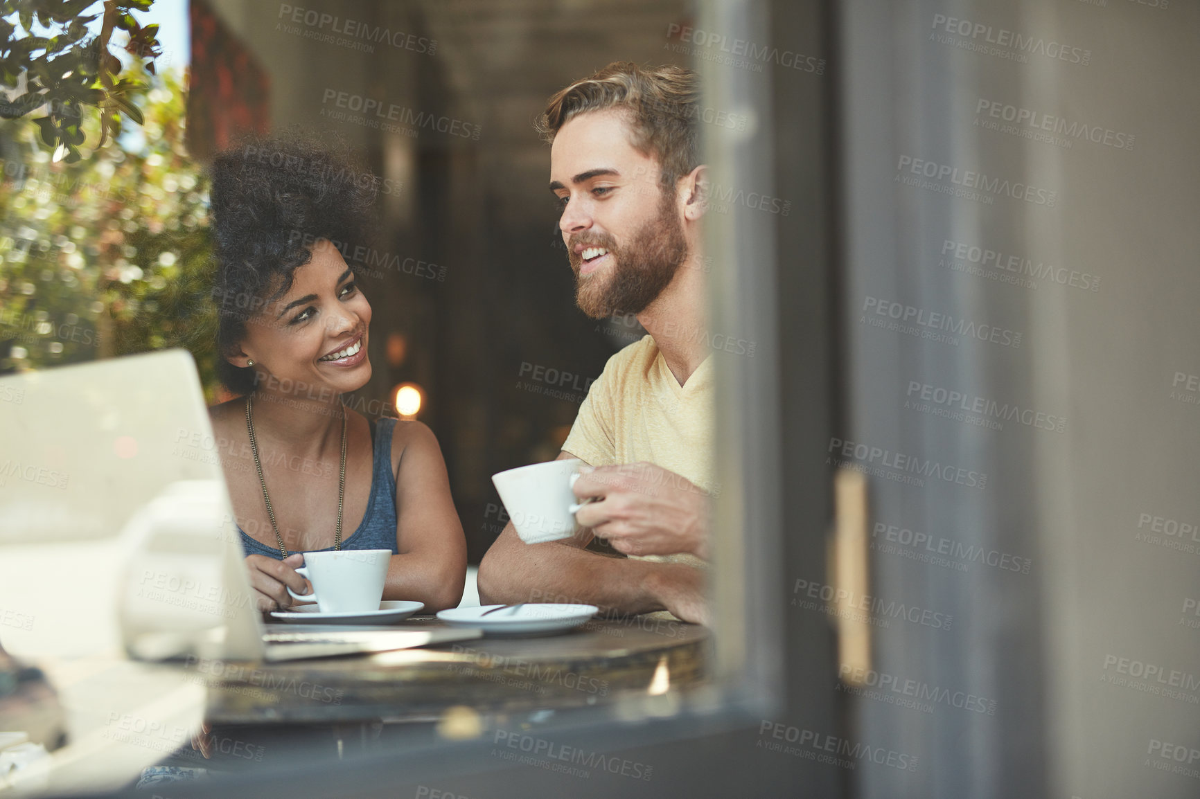 Buy stock photo Restaurant window, coffee and happy people, couple of friends or customer talking, speaking and on Valentines Day date. Tea shop drinks, conversation and man and African woman in retail cafe store