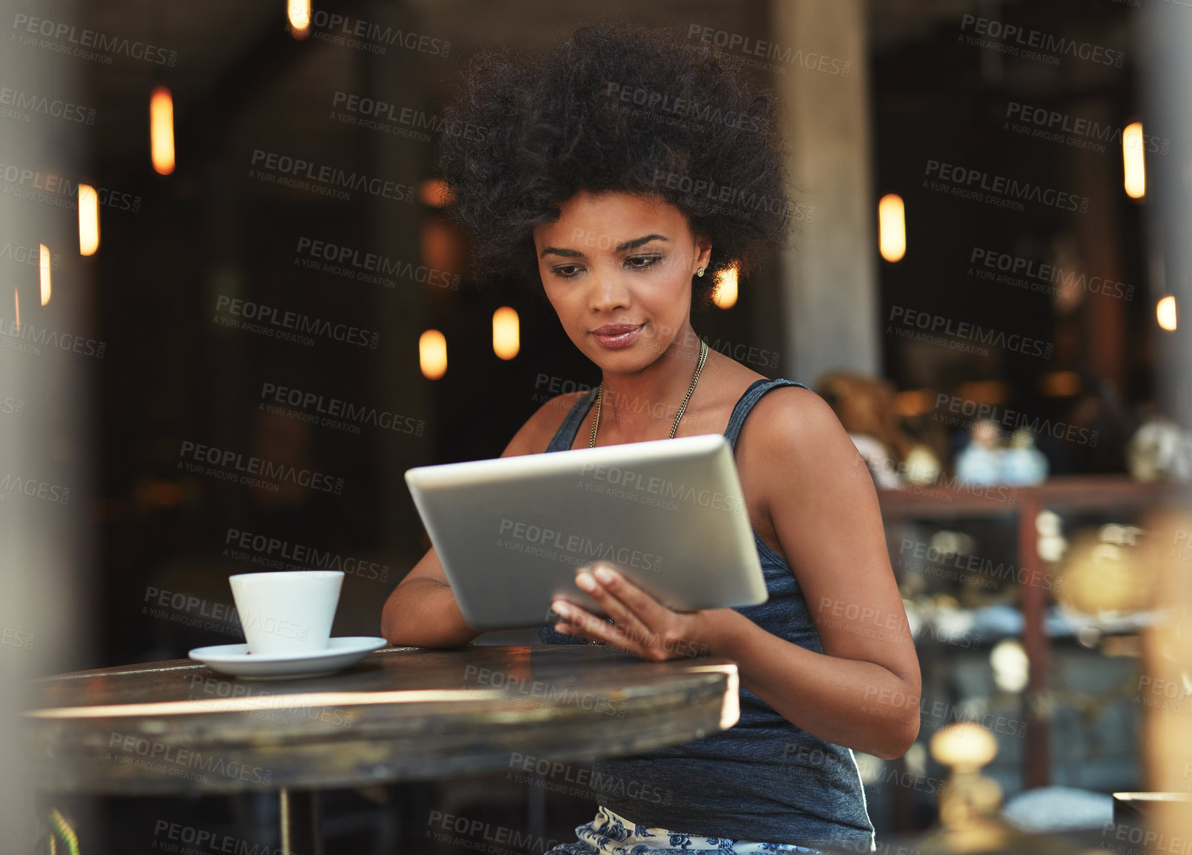 Buy stock photo Coffee shop, tablet or woman typing, scroll or focus on freelance blog, online retail review or cafe internet. Restaurant, service or small business client, customer or African person on social media