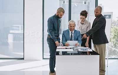 Buy stock photo Cropped shot of a group of businesspeople in the boardroom