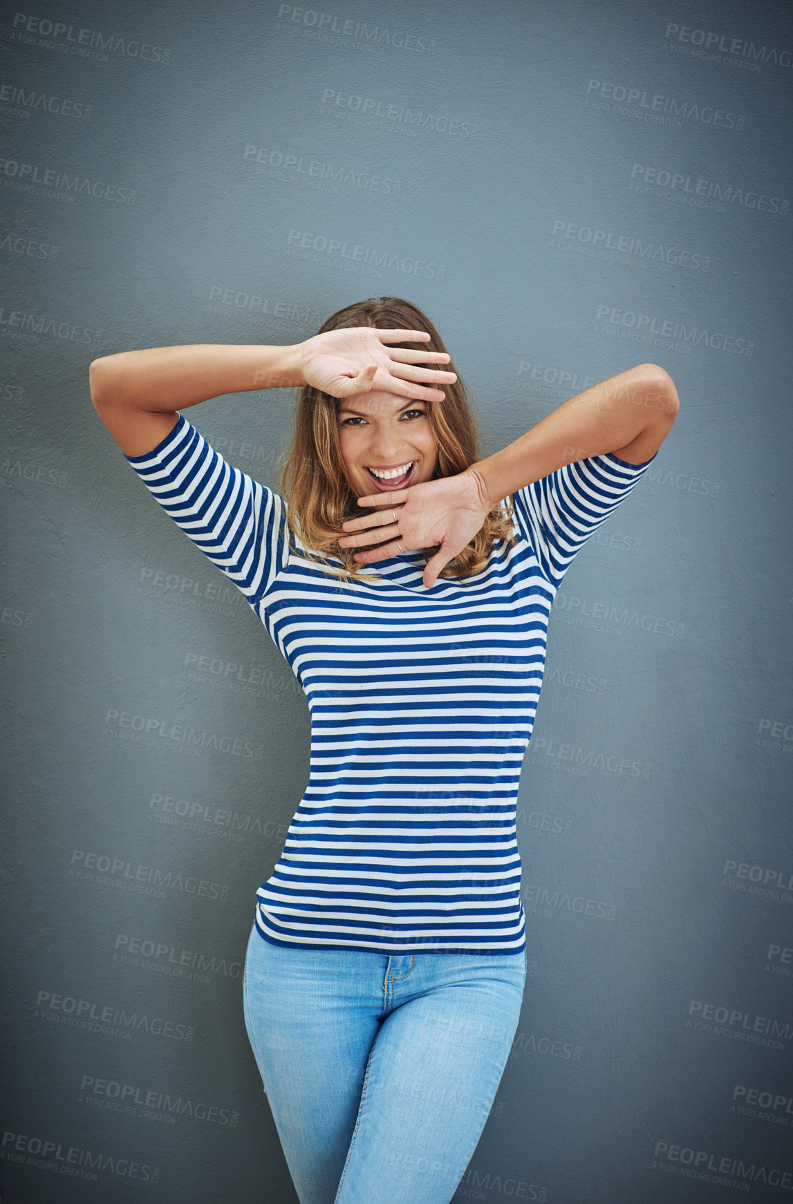 Buy stock photo Girl, happy and portrait in studio backdrop for fashion with joy for confidence, trendy or style. Female person, outfit and fun in isolated, excited and hand gesture for aesthetic in gray background