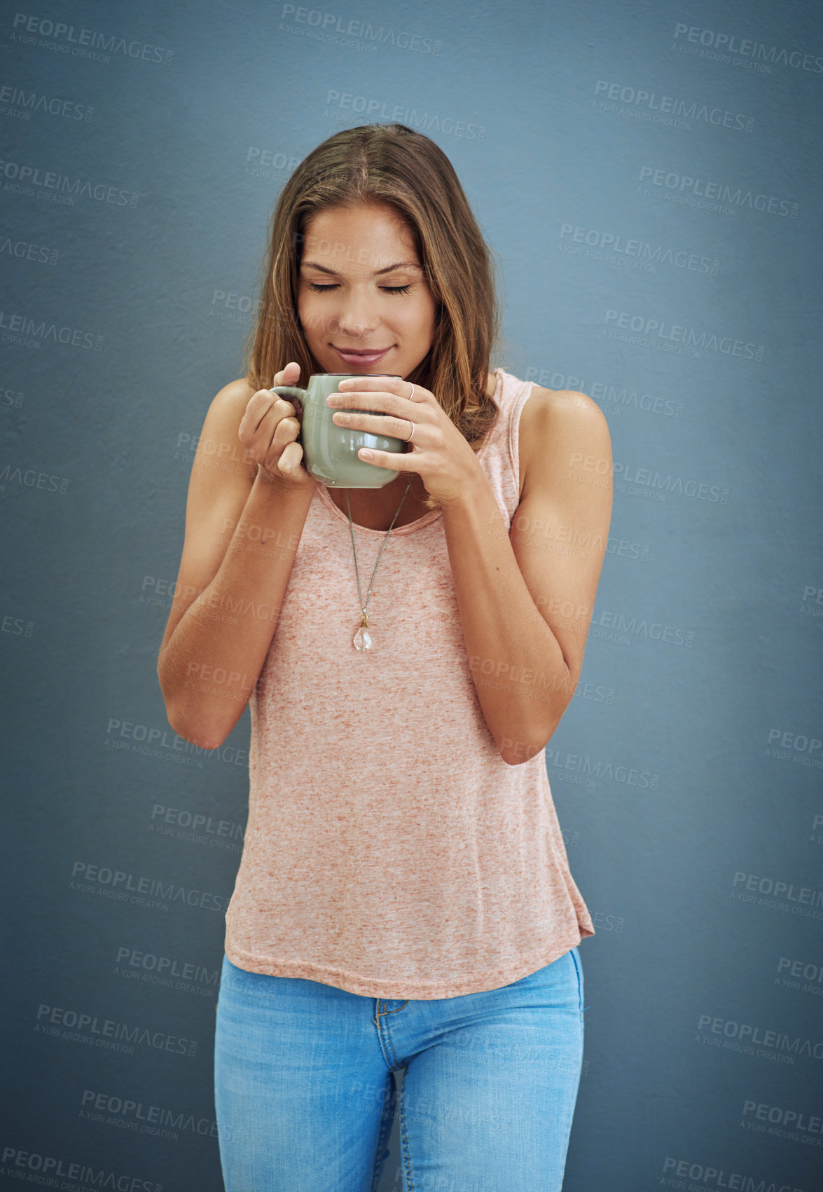 Buy stock photo Relax, smelling coffee and woman in studio with cup for caffeine, peace or hot beverage with gray background. Aroma, happiness and model with eyes closed for herbal tea, espresso or cappuccino