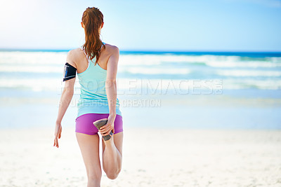 Buy stock photo Fitness, beach and woman stretching legs in warm up for running exercise, training or cardio workout in summer. Back view, runner and sports girl with balance, peace or freedom on holiday vacation
