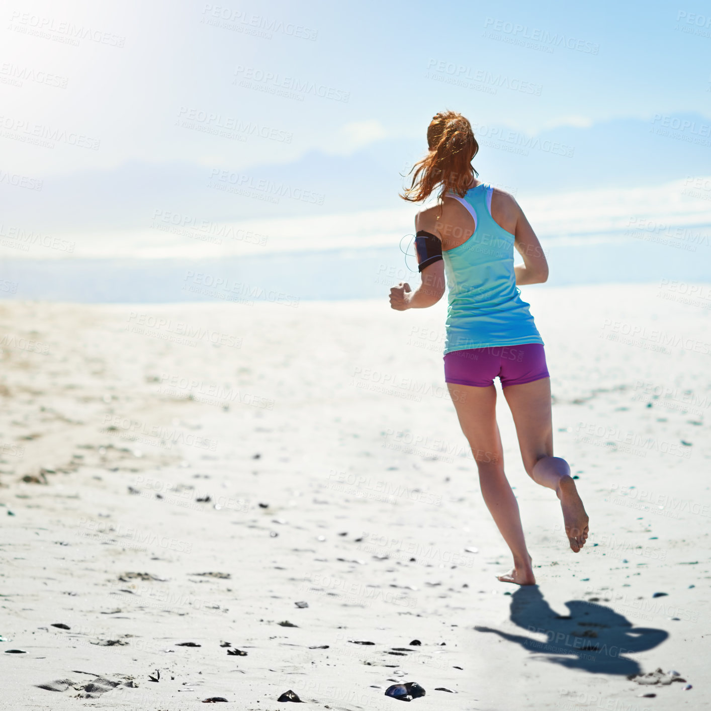 Buy stock photo Fitness, woman and running on sandy beach for healthy exercise, workout or cardio training in the outdoors. Active female runner or athlete exercising on a run for health and wellness on ocean mockup