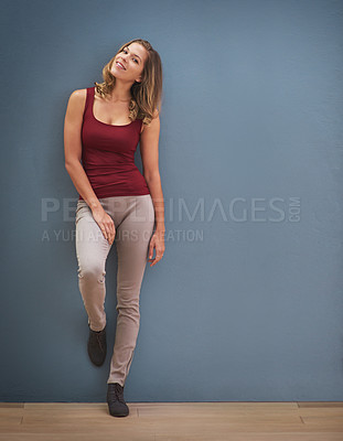 Buy stock photo Happy, smile and portrait of a slim woman isolated by a gray wall in the studio with mockup space. Happiness, healthy and beautiful girl model in casual clothes with a positive mindset or attitude.