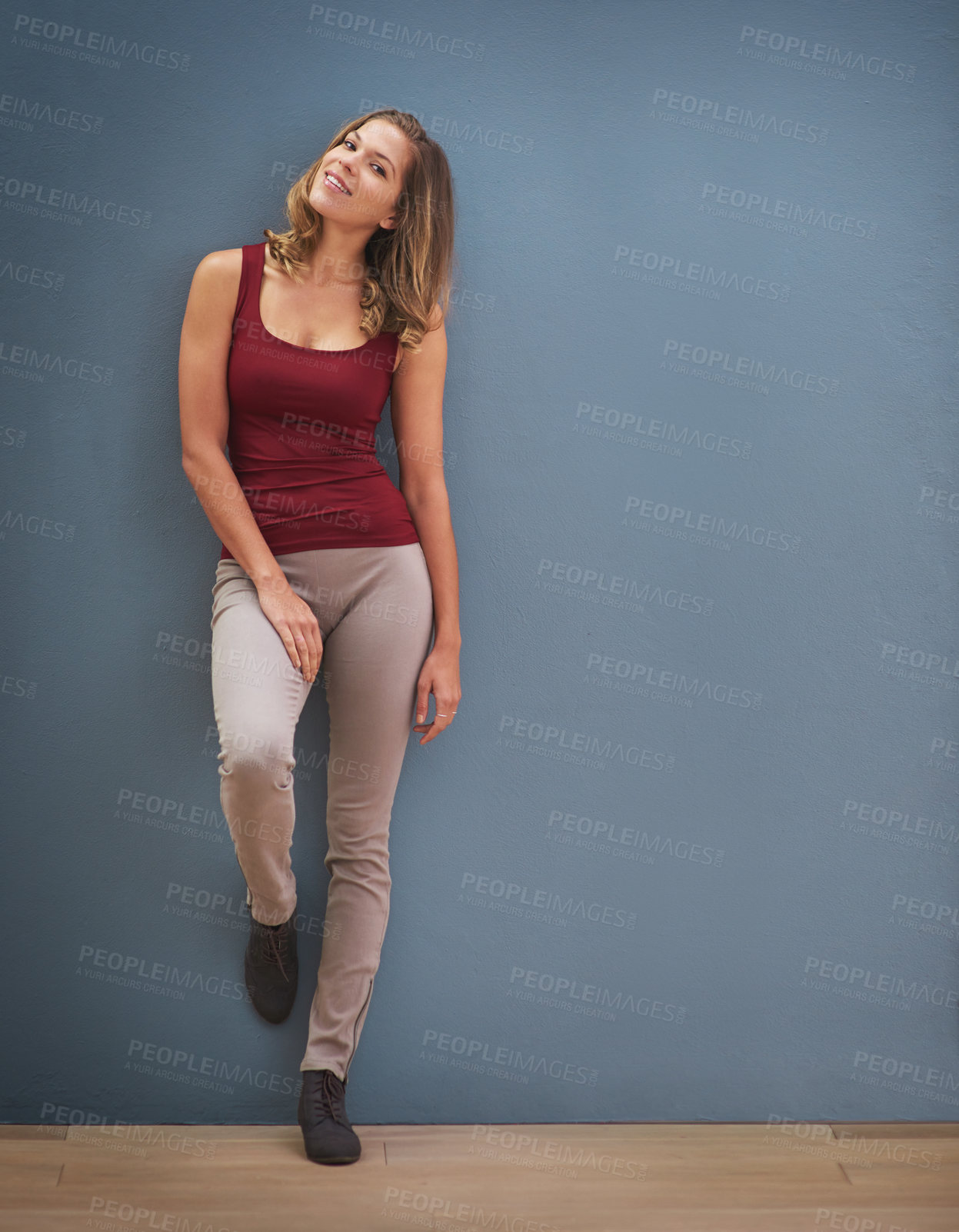 Buy stock photo Happy, smile and portrait of a slim woman isolated by a gray wall in the studio with mockup space. Happiness, healthy and beautiful girl model in casual clothes with a positive mindset or attitude.